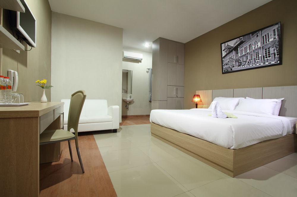 Oyo Flagship 3726 Tembok Batu Residence Tugu Kültér fotó
